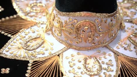 close up of a traditional mexican sombrero with golden color designs