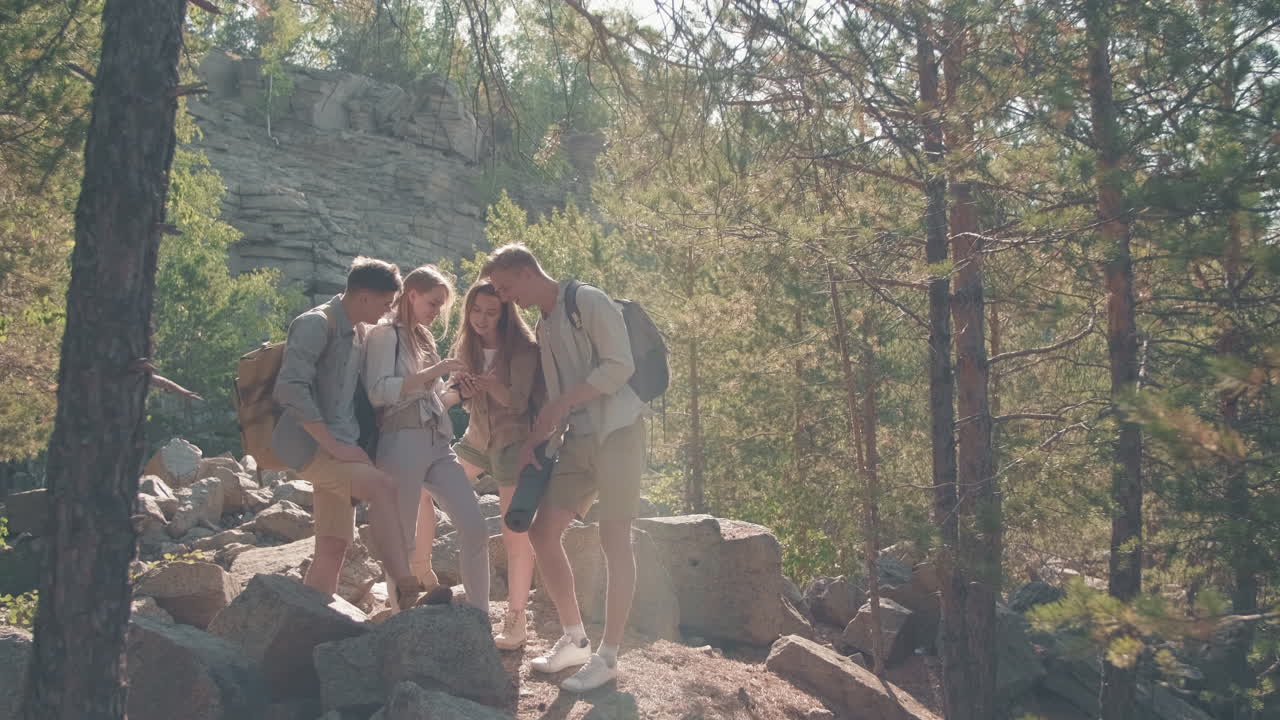 Young Friends Hiking on Sunny Day
