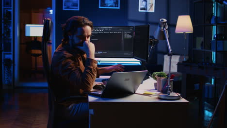 it expert doing multitasking in home office, listening music, drinking coffee