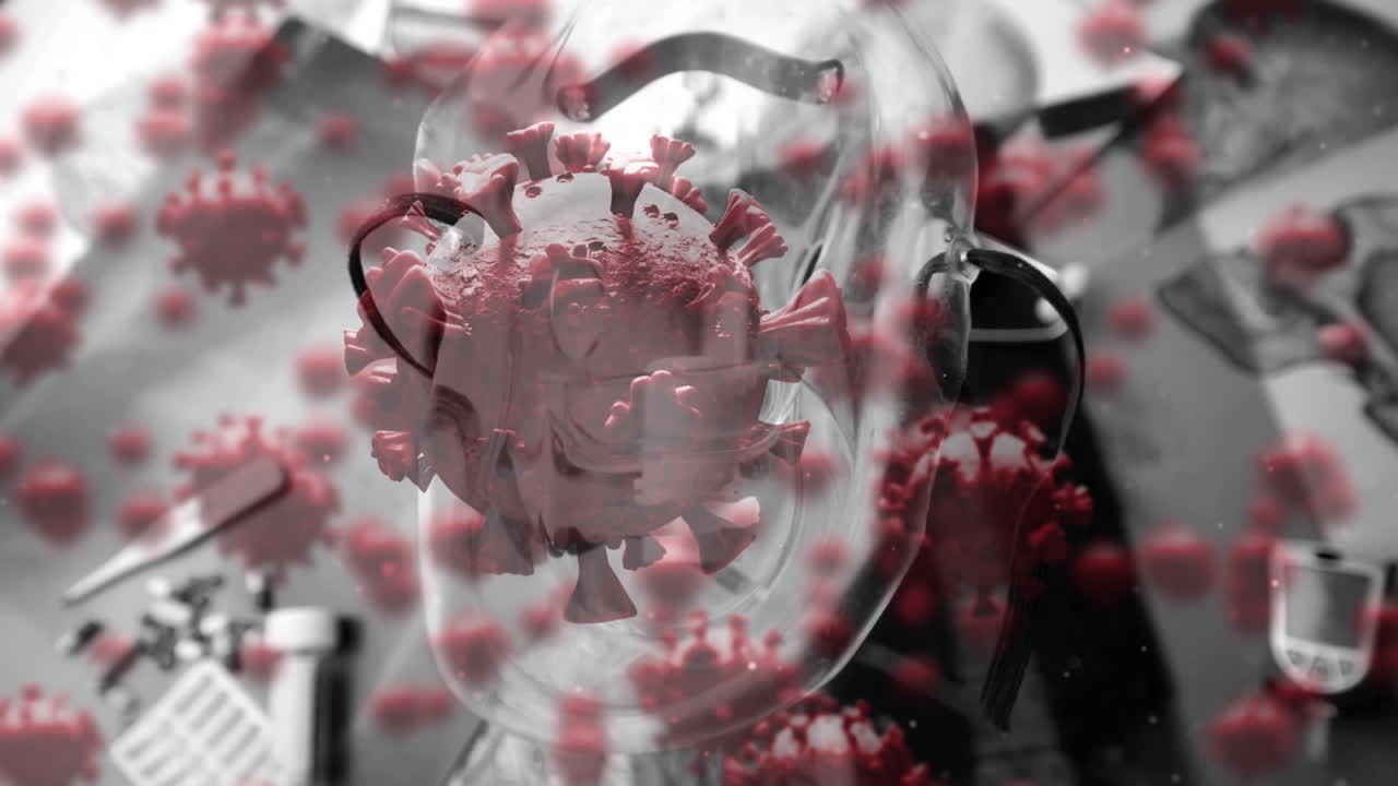 animación de células macro covid-19 flotando sobre la caída de la máscara en equipos médicos y rayos x