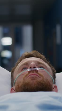 patient in hospital bed with nasal cannula