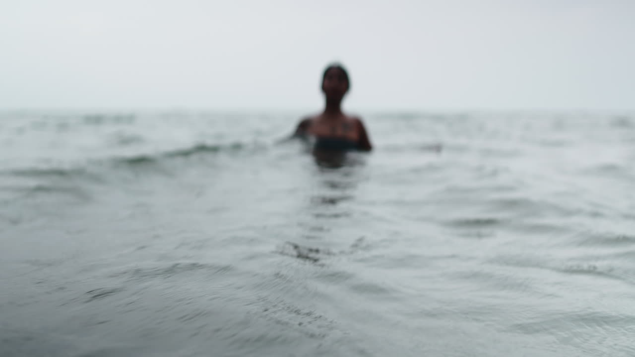 Person Swimming in the Ocean