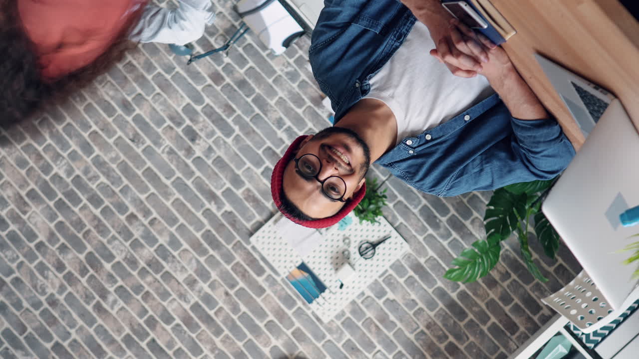 Man working at a modern desk in an office