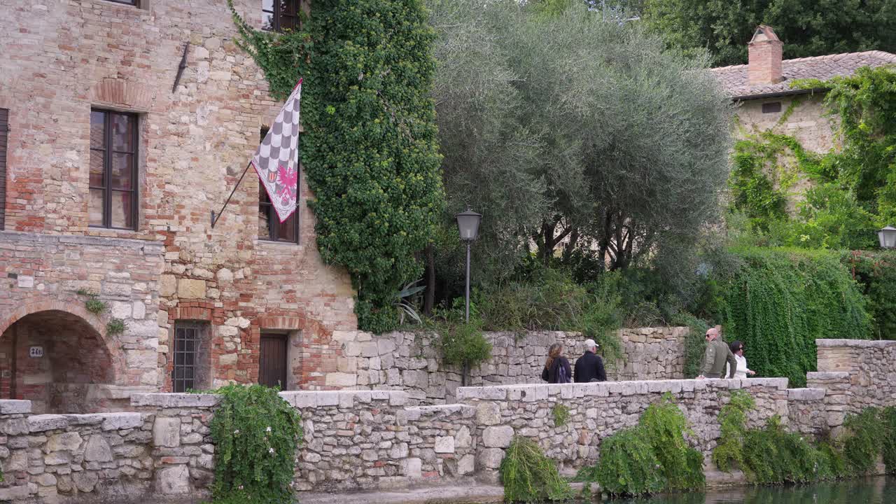 Historic Italian Village with Stone Walls and Canal