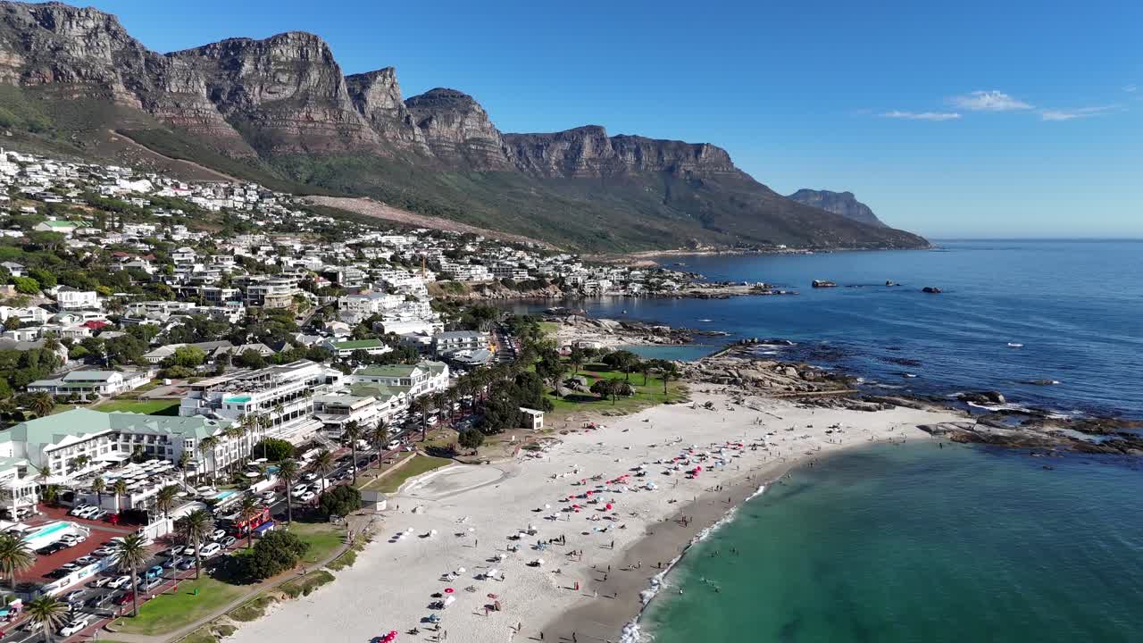 Aerial high angle view of Cape Town South Africa travel destination with table mountains in background and white sand beach