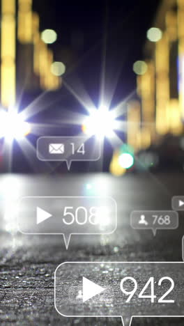 animation of social media icons and numbers over out of focus city and road traffic lights