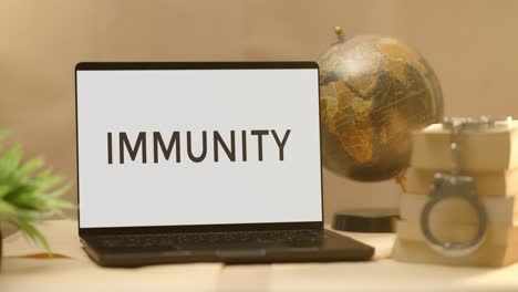 immunity displayed in legal laptop screen