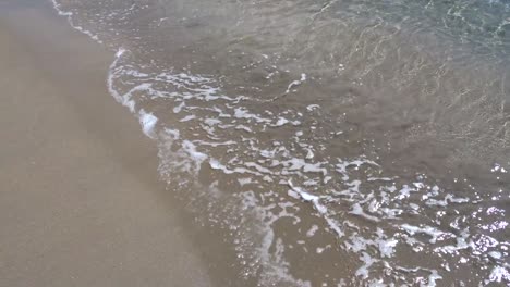 Small-waves-over-the-sand-of-a-beach-in-the-Spanish-Mediterranean-coast