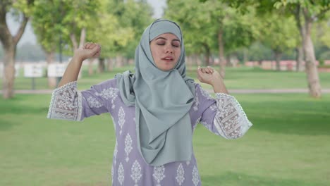 Sleepy-and-tired-Muslim-woman-in-park