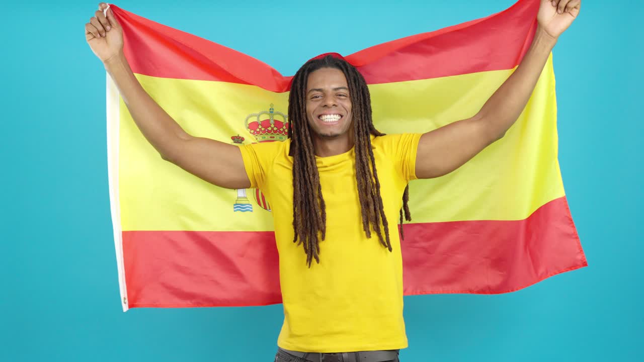 Man holding the Spanish flag