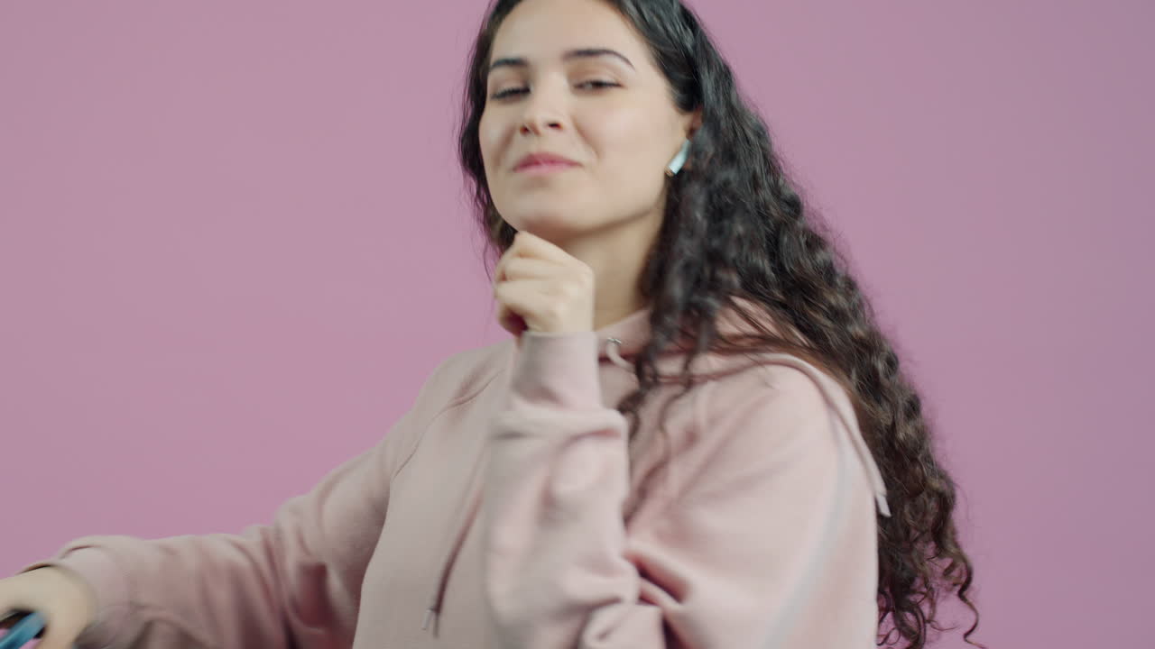 Woman enjoying music with headphones and phone