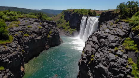 majestic waterfall in a rocky canyon