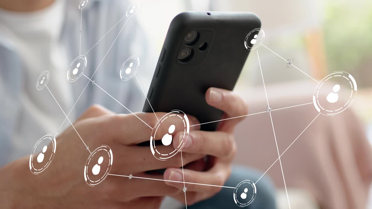 Man holding smartphone thumb tapping activating contact nodes visualizing tech network over phone
