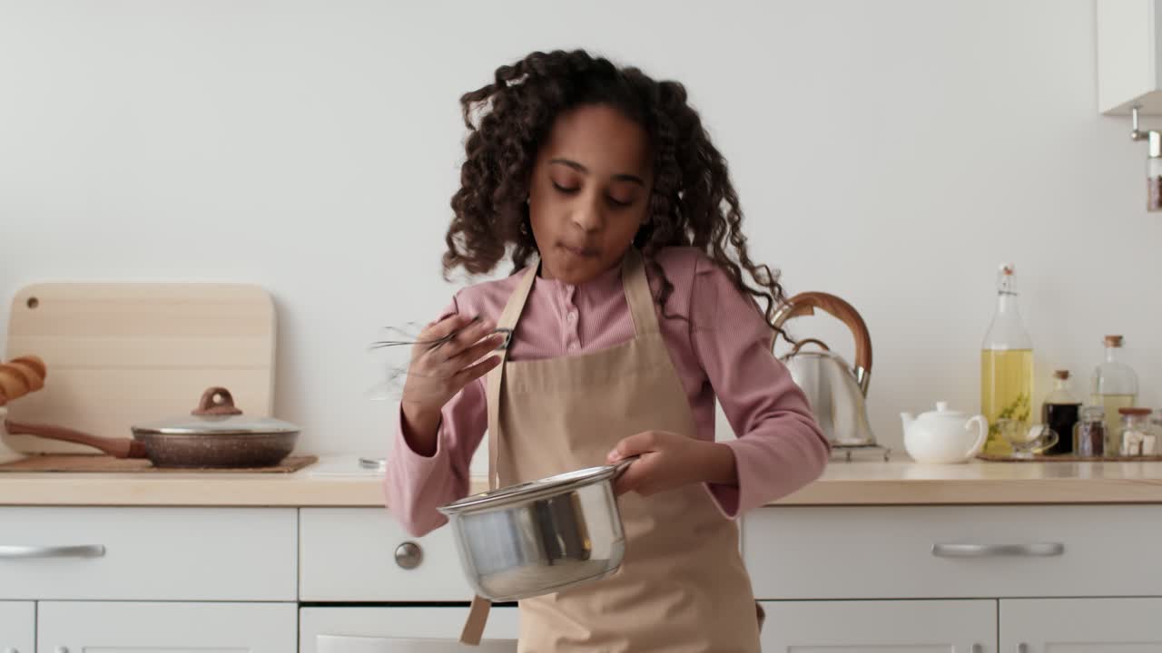 Girl Cooking in the Kitchen