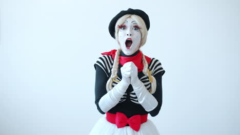 mime woman expressing joy