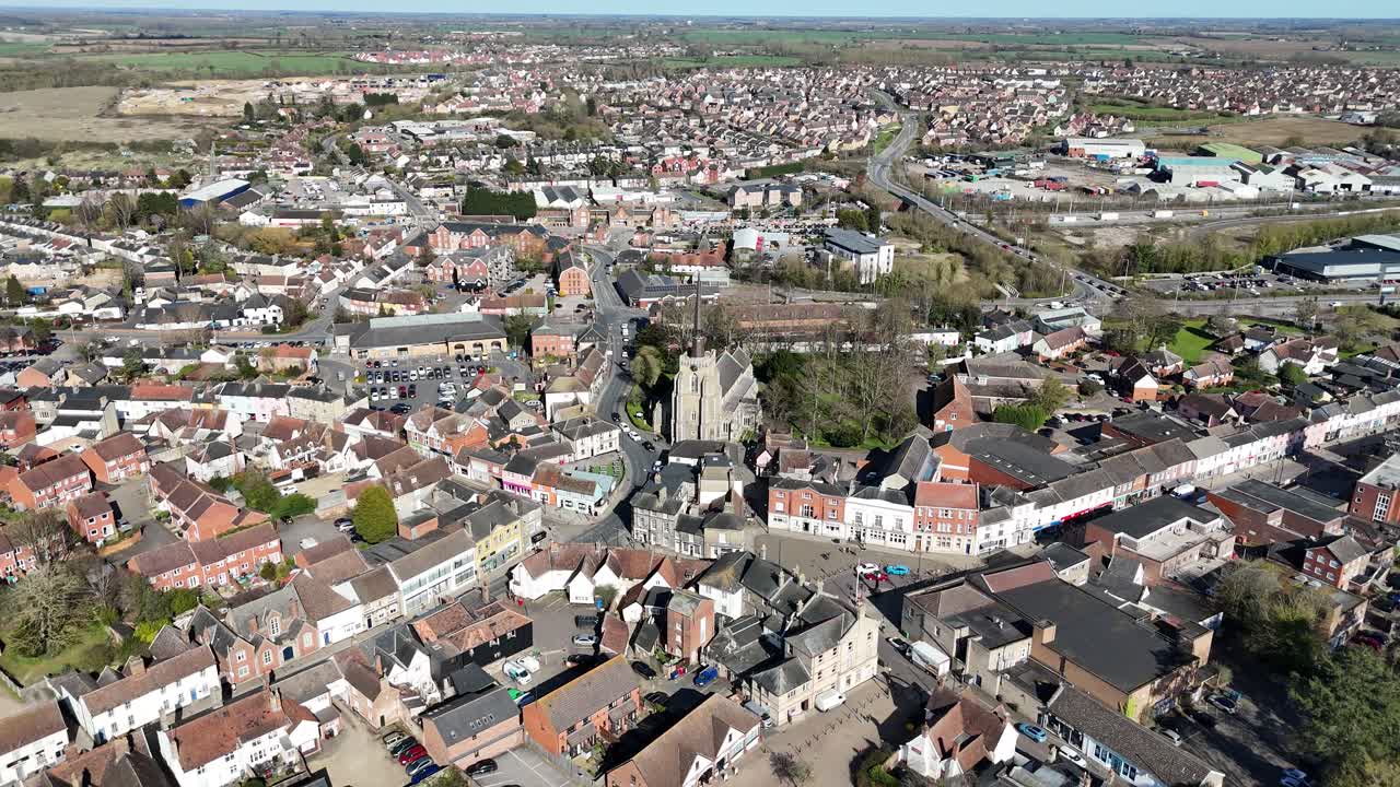Stowmarket town centre Suffolk UK pull back drone aerial reverse reveal