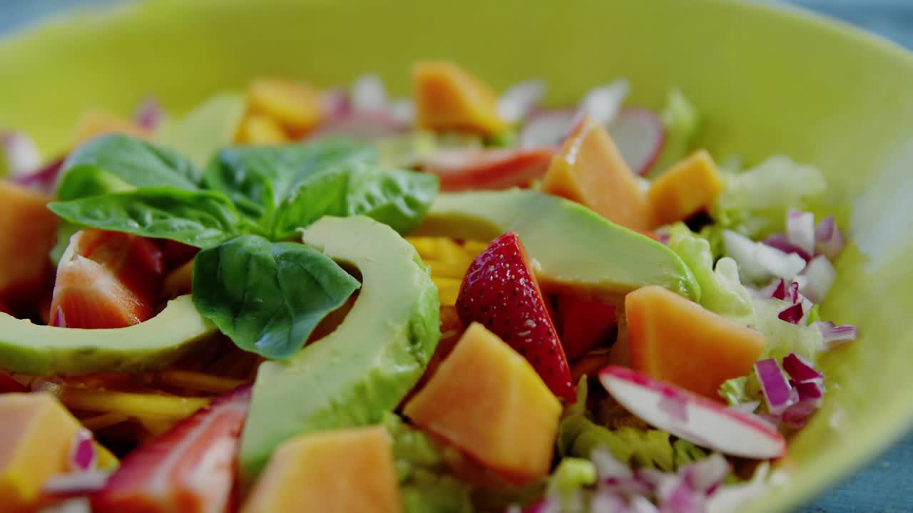 Map overlay appearing HUD graphics animating over lime salad bowl lens shifting showing food data