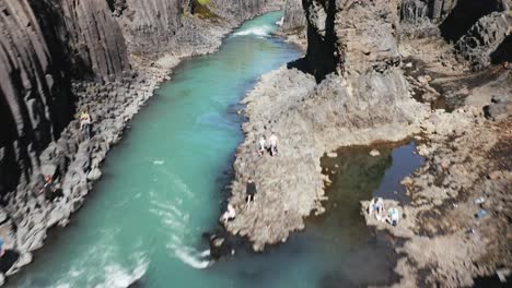 iconic studlagil ravine in famous iceland landscape during summer, aerial