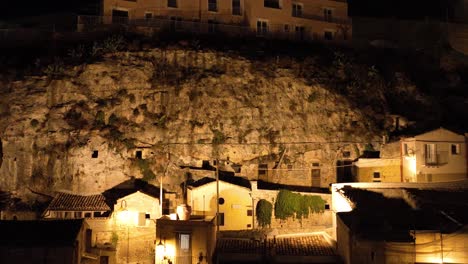 aerial view of modica alta val di noto sicily old baroque town ancient cave houses southern italy at night