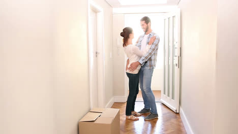 attractive couple walking over the threshold