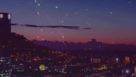 animation of network of connections with glowing spots over cityscape