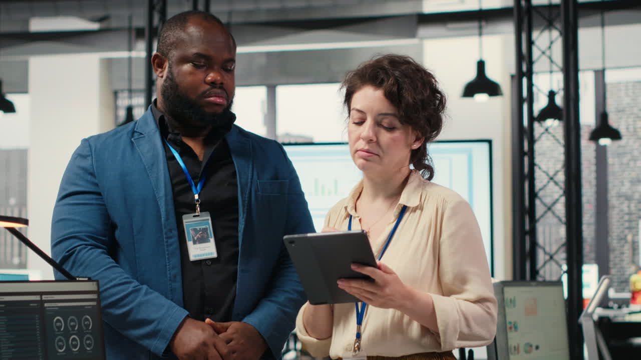 Vertical Video Diverse workers team use digital tools and analytics to improve growth strategy