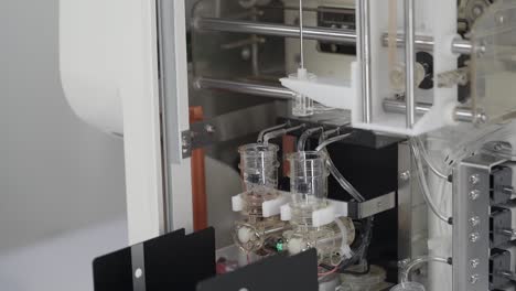 view of electrodes and tubing inside an automatic electrolyte analyzing machine