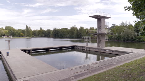 diving platform, daylight, autumn, woog outdoor pool lake darmstadt, hessen, germany