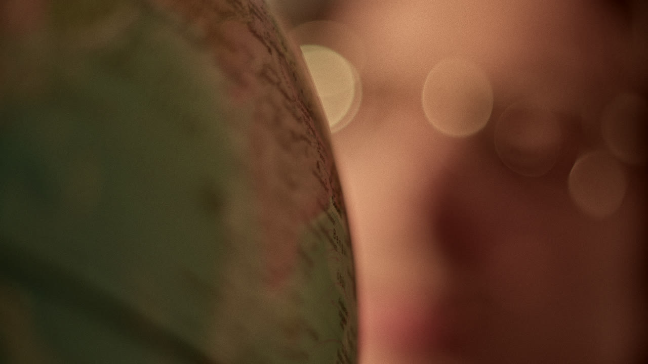 Close-up of a globe with a blurred bokeh background