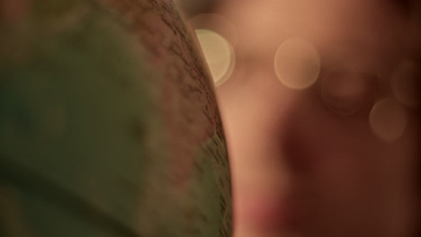close-up of a globe with a blurred bokeh background