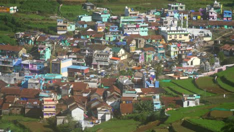 Poombarai-village-on-Palani-hills-nestled-among-terraced-fields-and-lush-greenery,-Kodaikanal,-Tamil-Nadu,-India