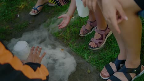 kids playing with dry ice outdoors