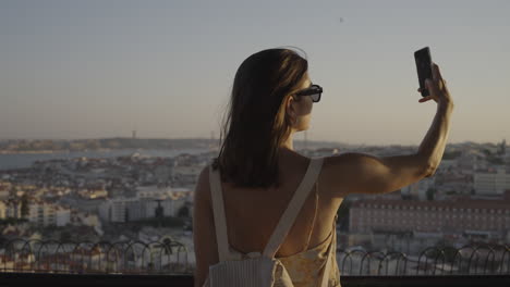 woman taking a selfie in lisbon