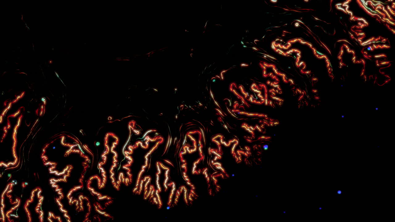 Swirling substances mixing together, creating colorful, fluid patterns in close-up view