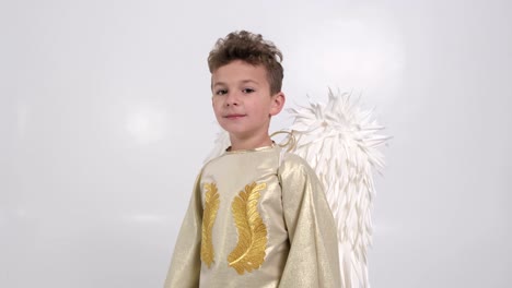 boy in angel costume