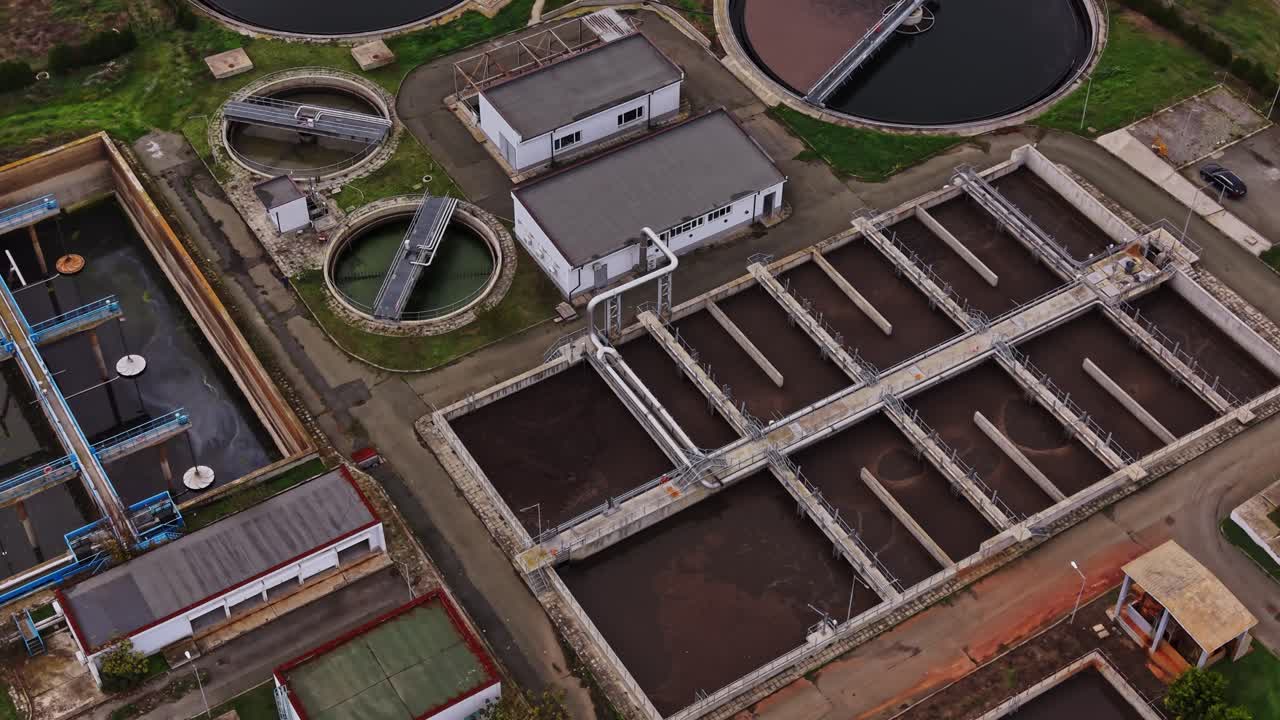 Wastewater treatment facility viewed from above during daytime hours