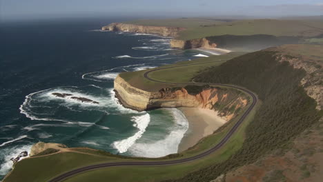 aerial view of scenic coastal cliffs and winding road