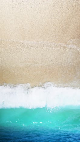 summer beach sign on tropical coast with turquoise water and blue sky