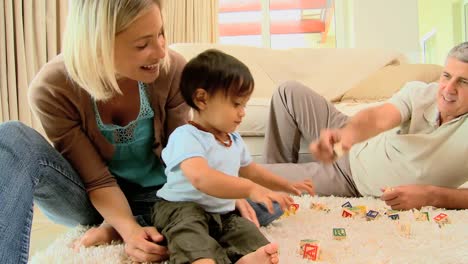 parents spending time with their little child