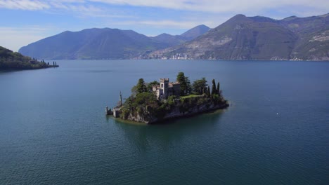 Aerial-dolly-out-revealing-castle-in-Loreto-island,-Iseo-lake