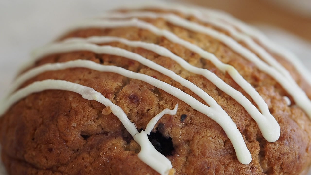 Close-up of a Delicious Muffin Drizzled with White Icing