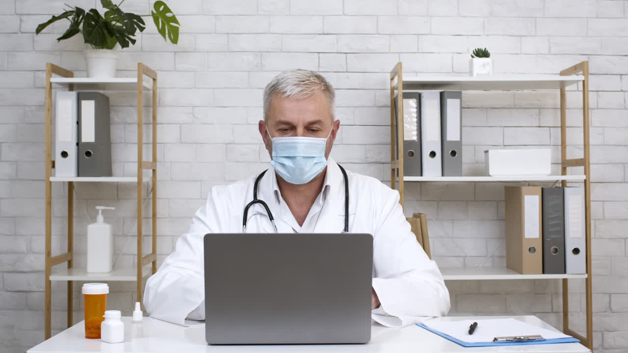 Doctor in online consultation with patient