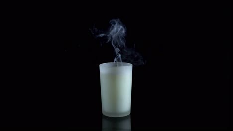 burning candle with smoke