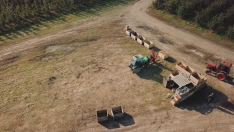 tractor working on the farm. aerial view of agricultural transport working in the field