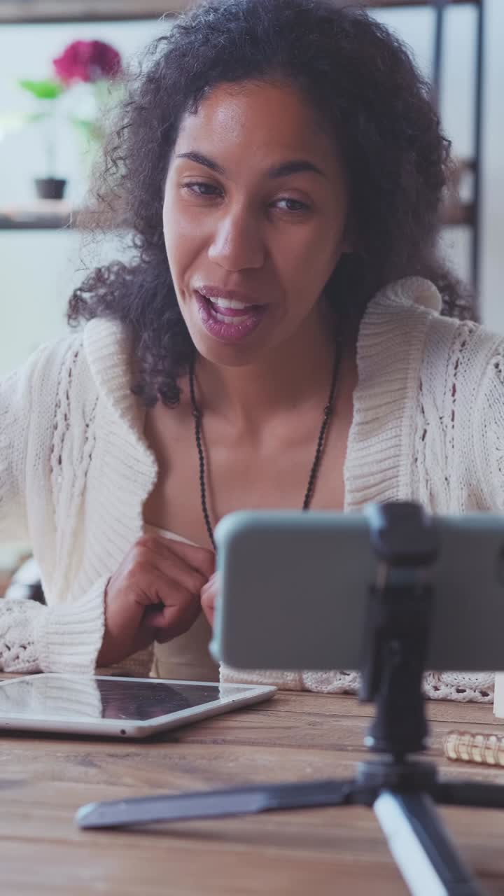 Joyful virtual connection with friends during a cozy indoor afternoon