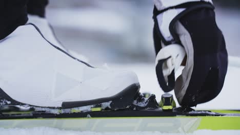 extreme close up of skiis being loosened