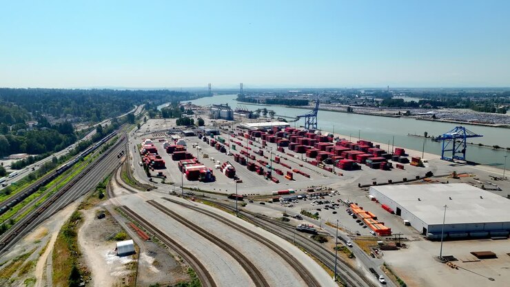 Aerial View Of New Westminster Port, Shipping Service Along The Fraser River In Canada