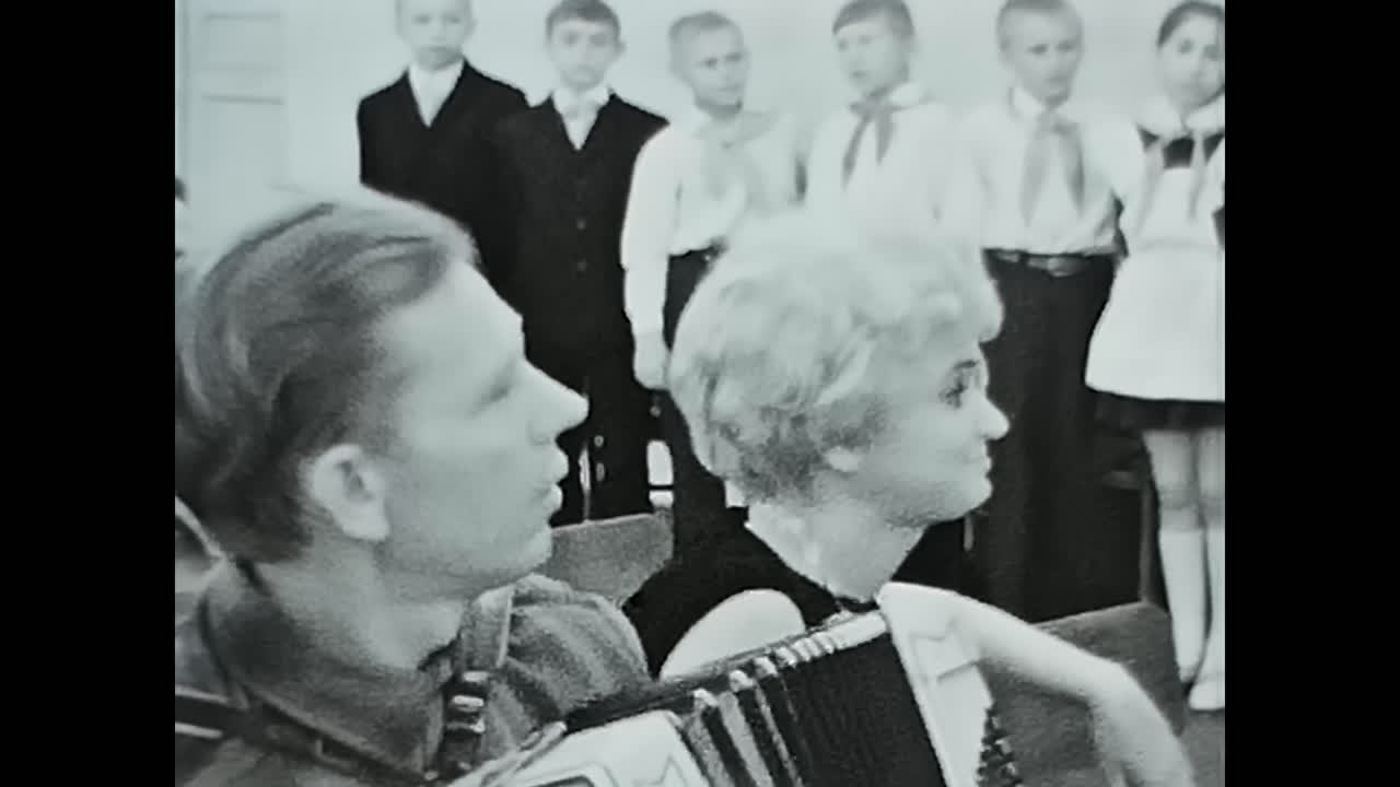 A group of pioneers at a meeting at school. CIRCA USSR 1970: A group of pioneers at a meeting at school