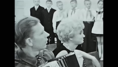 a group of pioneers at a meeting at school. circa ussr 1970: a group of pioneers at a meeting at school