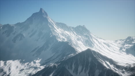 mountain winter caucasus landscape with white glaciers and rocky peak